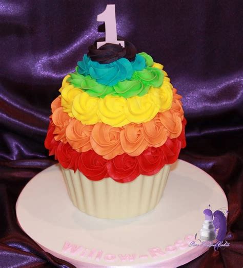 rainbow giant cupcake smash cake with 7 rainbow layers inside rainbow parties rainbow birthday