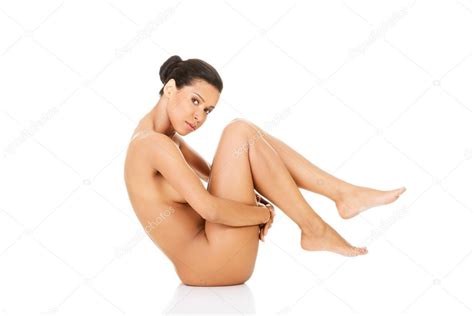 Mujer Desnuda Hermosa En Un Agacharse Sosteniendo Sus Rodillas