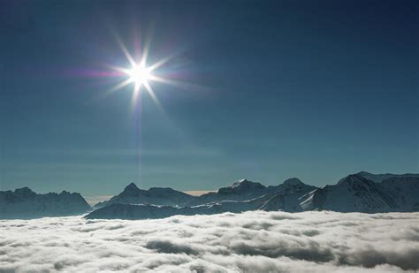 Sun Over Fog In The Swiss Alps Photograph By Buena Vista Images Fine