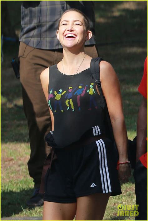 Kate Hudson Displays Shaved Head On Set Wears Eclipse Glasses Photo