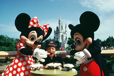 Mickey Mouse And Minnie Mouse Feeding Child Ice Cream Magic Kingdom