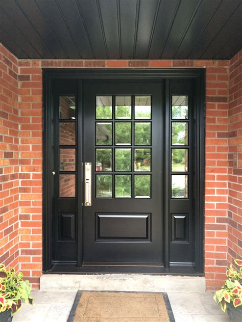 This Richly Black Stained Solid Mahogany Amberwood Custom Door With