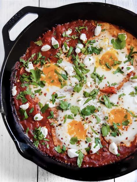 Shakshuka Is A Super Flavorful Dish With Eggs Poached In A Tomato Sauce