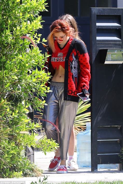 Bella Thorne Flaunts Her Chiseled Midriff In Devils Gear Daily Mail