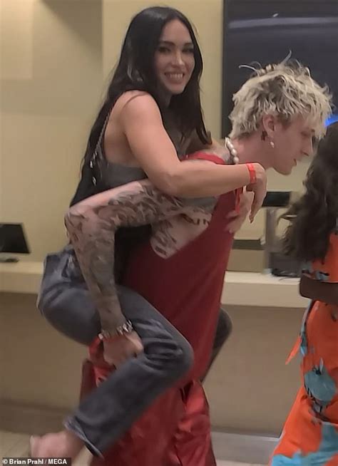 Machine Gun Kelly Gives Girlfriend Megan Fox A Piggyback To Their VIP