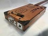 Tuning Cigar Box Guitar Pictures