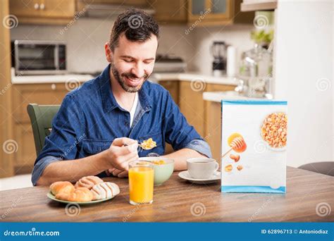 Guy Eating Cereal For Breakfast Stock Photo Image 62896713