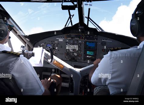 View Of The Cockpit Of A Small Airplane Flying In The Sky Team Of