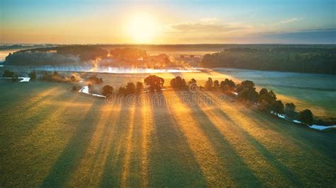 First Sunrays Over Green Meadow And Field Sunny Summer Calm Morning