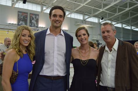 (l to r): Erin and Broncos quarterback Brock Osweiler, with event chair
