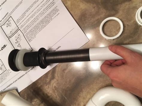 After the sink is firmly in place, proceed to position the mounting rings atop the drainage openings and finish off by setting the vessel on the ring. Installing Vessel Sink, nothing is fitting...need help on ...