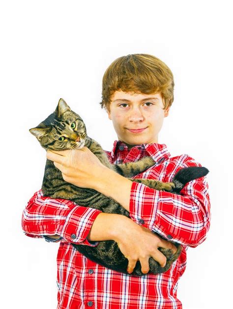 Teen Boy Holds His Tabby Cat In His Arms Stock Image Image Of