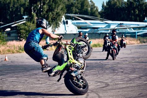 Moto Rider Making A Stunt On His Motorbike Stunt Motorcycle Rider