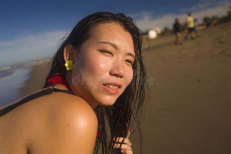 Summer Lifestyle Portrait Of Young Happy And Attractive Asian Chinese Woman In Bikini At