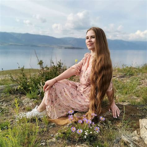 28 Year Old Russian Woman Shows Off Her Ankle Length Hair That She Has Been Growing For 23 Years