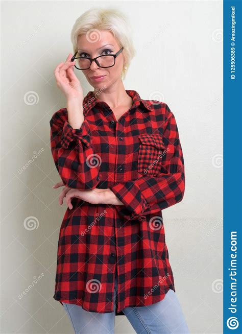 Beautiful Blonde Hipster Woman With Short Hair Wearing Eyeglasses Stock