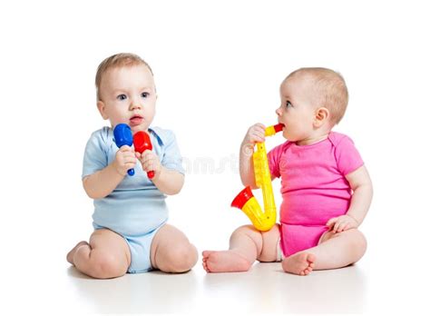 Babies Girl And Boy Play Musical Toys Stock Photo Image Of Playful