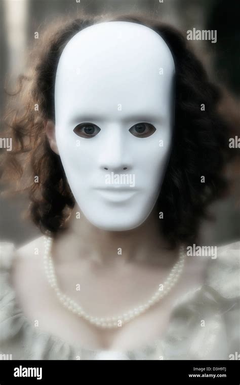 Woman With A White Mask Stock Photo Alamy