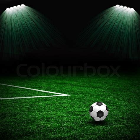 Soccer Ball On The Green Field And Lightning Stock Photo Colourbox