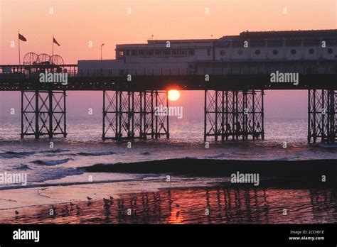 Sunset Under The Palace Pier Brighton East Sussex England Uk Circa
