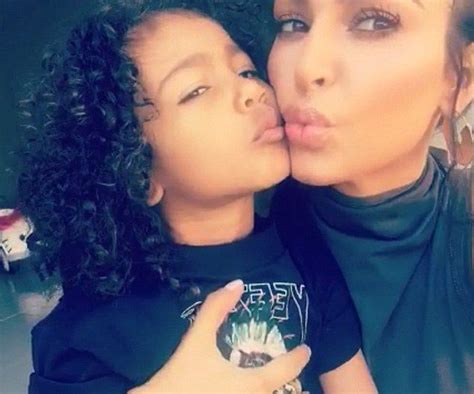 gimme kiss north west shares a tender moment with mom kim kardashian as the pair play with