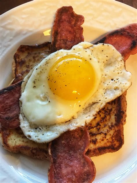 French Toast Topped With Bacon And A Fried Egg Egg Recipes For