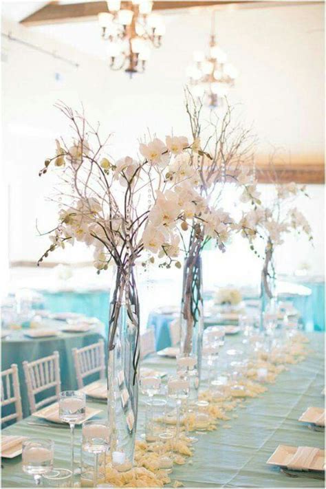 Love these center pieces! | Flower centerpieces wedding, Beach wedding