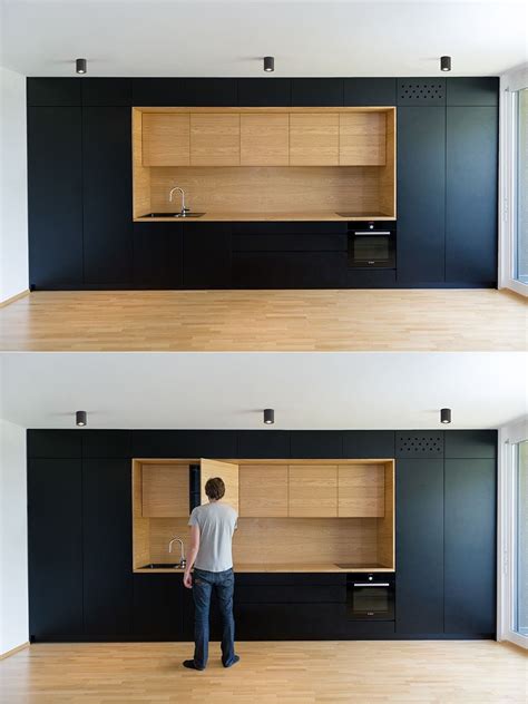 The result is a very modern look. Black and wood as used here are entirely minimalist, with ...