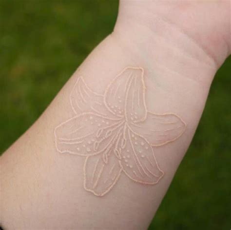 60 Best White Tattoos That Will Show Off Your Style Meanings Ideas And Designs White Tattoo