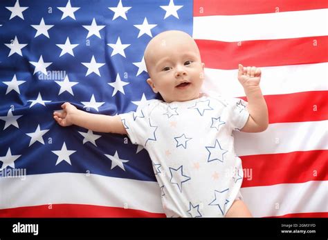 Cute Baby On American Flag Background Stock Photo Alamy