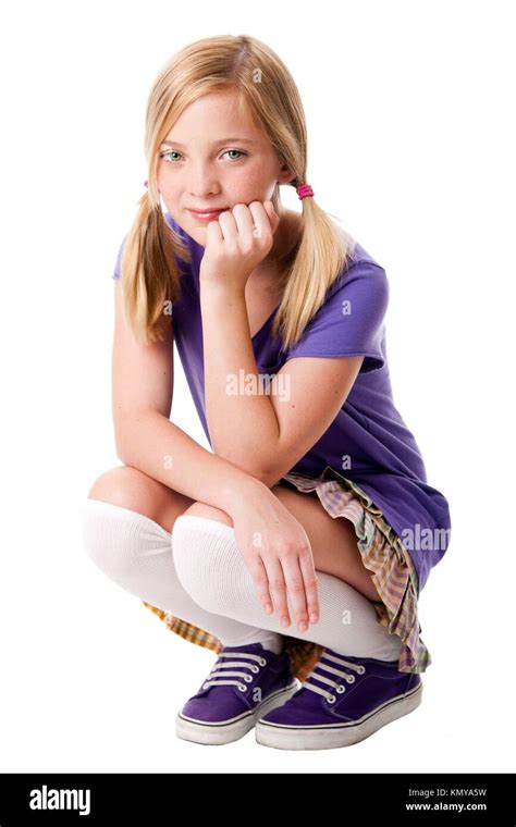 Beautiful Happy Teenage Girl Sitting Squatted Wearing Knee Socks Puple Sporty Shoes Shirt And