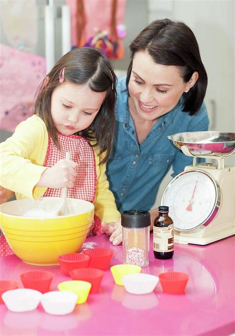 Mother And Daughter Baking Photograph By Ian Hooton Pixels