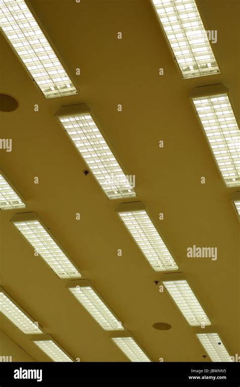 Rows Of Fluorescent Lamps Of Office Ceiling Stock Photo Alamy