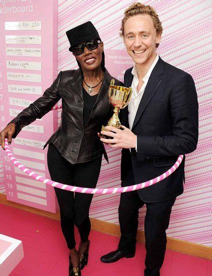 What Of Course Tom Hiddleston Is In A Hula Hoop With Grace Jones