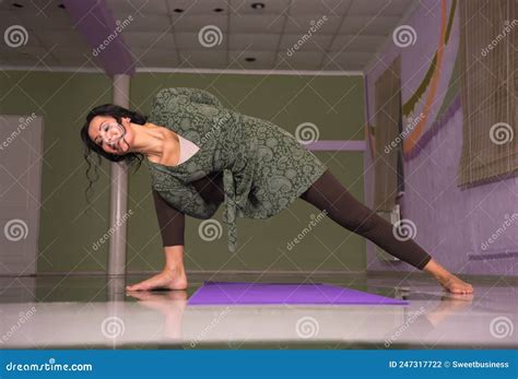 Yoga Master Stretches Yoga Poses In Fitness Class Stock Photo Image