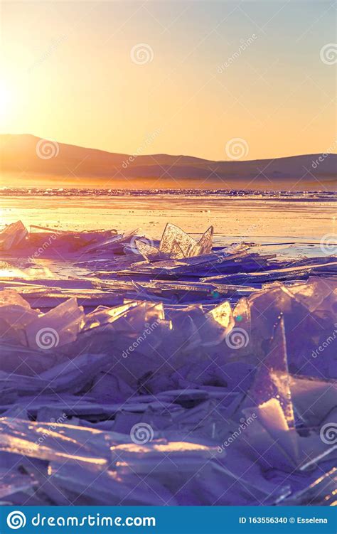 Colorful Sunset Over The Crystal Ice Of Baikal Lake Stock