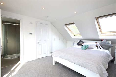 Amusing small attic bed room idea with ceiling design idea plus glass roof also pink bed. Loft Conversion Bedroom And Ensuite | online information