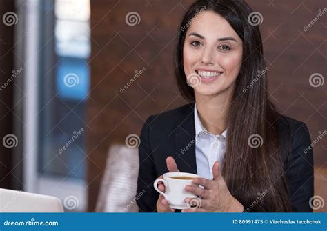 Beautiful Woman Drinking Coffee In A Office Stock Image Image Of