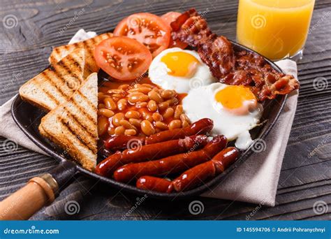 Delicious English Breakfast On A Dark Rustic Background Stock Photo