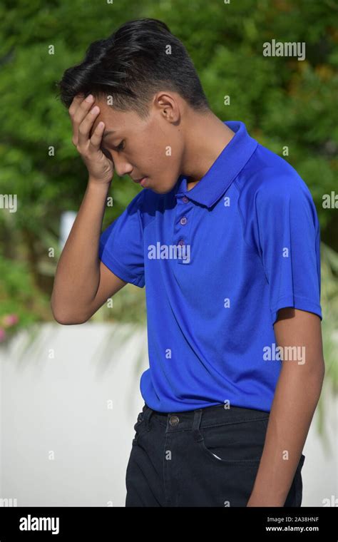 A Sad Filipino Person Stock Photo Alamy