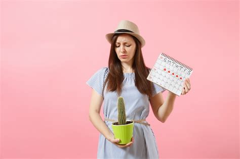 Premium Photo Sad Sickness Woman In Blue Dress Holding Green Cactus