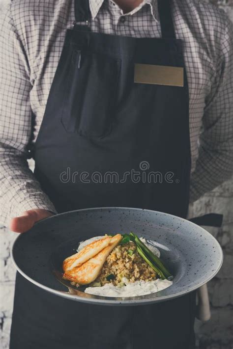 Waiter Offering Delicious Restaurant Dish Stock Image Image Of Hand