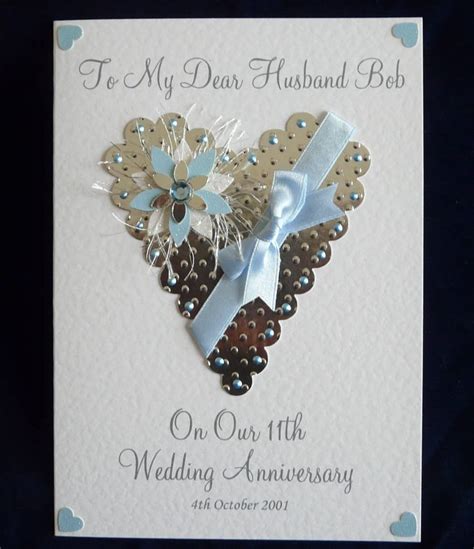 A Wedding Anniversary Card With A Heart Shaped Brooch