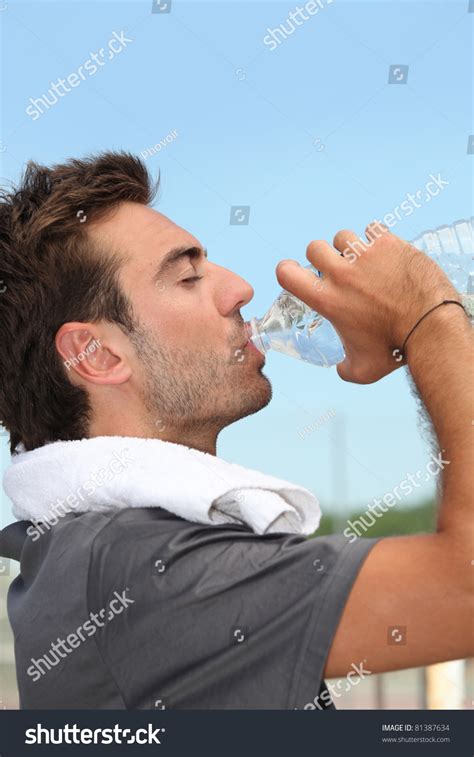 Man Drinking Bottle Of Water Stock Photo 81387634