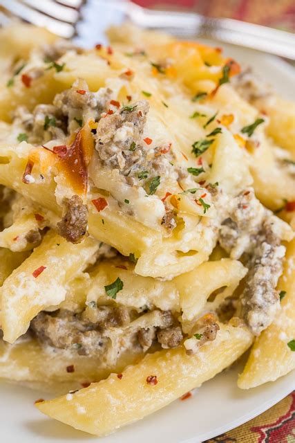 This healthy alfredo sauce is lightened up with skim milk and your choice of broth (chicken or veggie for flava), but is kept creamy with the help of non this is not as thick and creamy as your typical alfredo sauce, but that's to be expected! Three Cheese Italian Sausage Alfredo Bake | Plain Chicken®