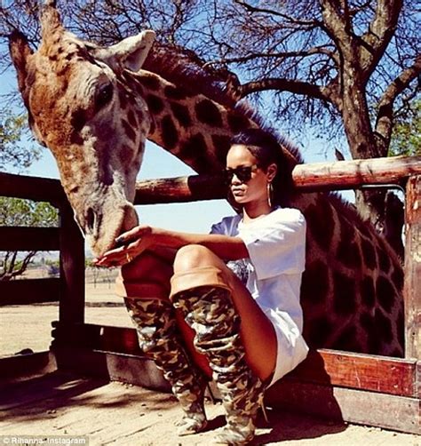 Wild Girl Rihanna Embraces An Elephant As She Continues Her Safari