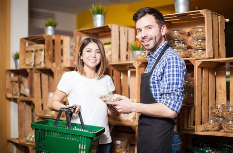 Bigstock Store Clerk Helping A Customer Candk Market Inc