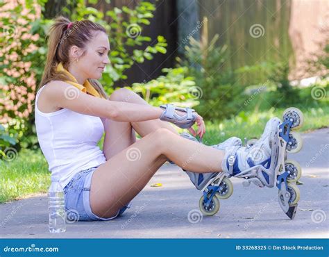 Young Female Skater Ties Her Rollers Stock Image Image Of Park Adult