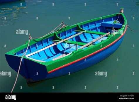 Green Blue And Red Wooden Boat Painted In Bright Traditional Colours