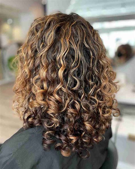 curly brown hair with highlights